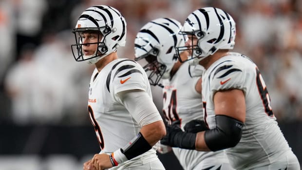 Cincinnati Bengals quarterback Joe Burrow (9) leads the offense onto the field in the third quarter of the NFL Week 3 game between the Cincinnati Bengals and the Los Angeles Rams at Paycor Stadium in downtown Cincinnati on Monday, Sept. 25, 2023. The Bengals beat the Rams, 19-16, improving to 1-2.  